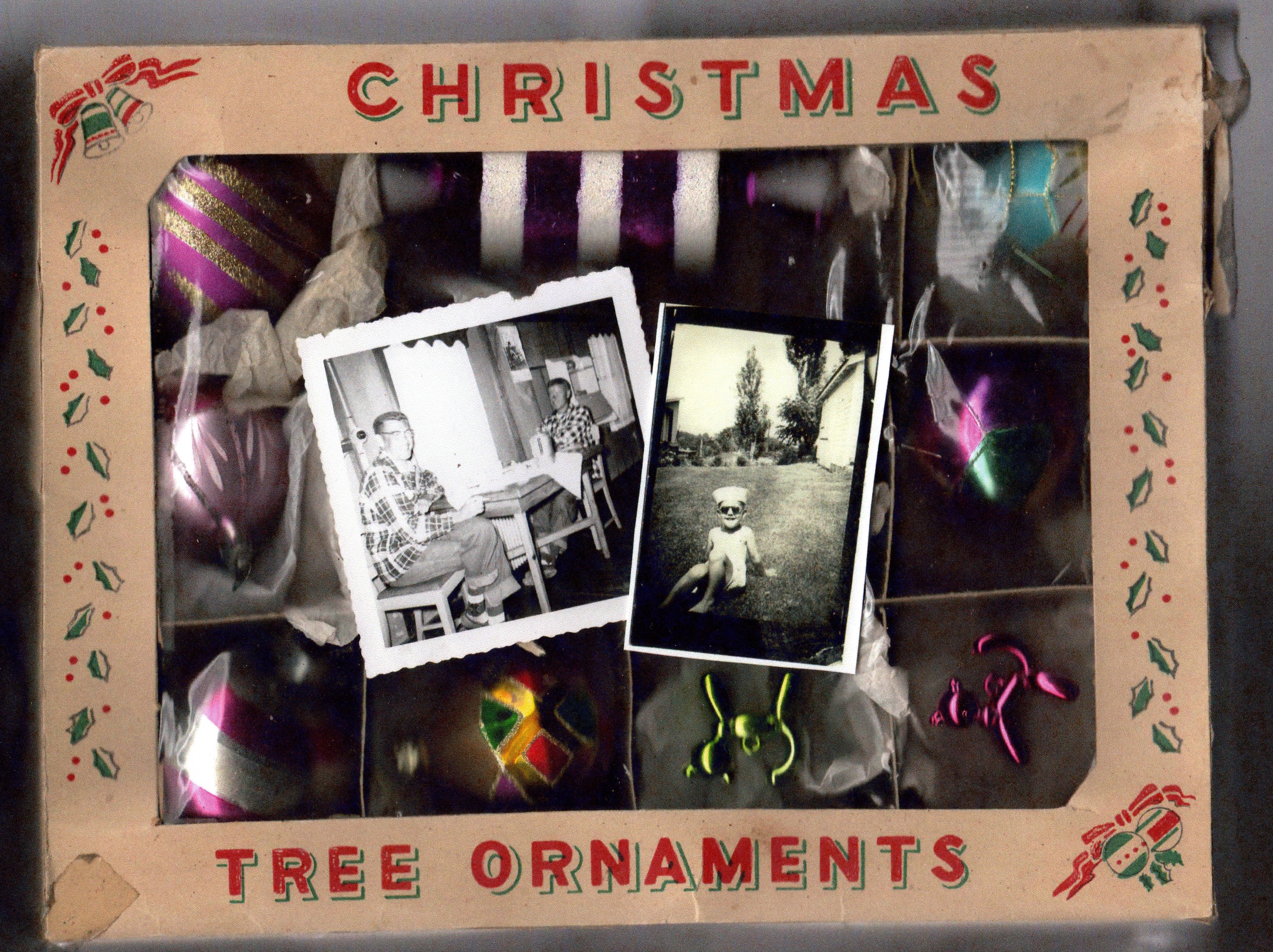 Box of Christmas tree ornaments with vintage photos inside